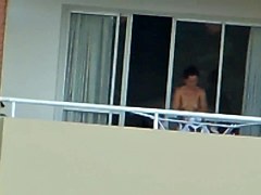 girl nude in balcony argentina far away ( 200 m)