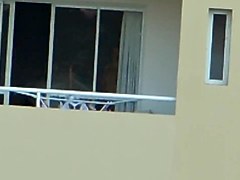 girl nude in balcony argentina far away ( 200 m)