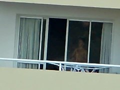 girl nude in balcony argentina far away ( 200 m)