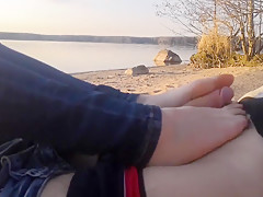 public footjob and socksjob on the beach