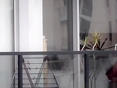 secretly spies on his neighbor
