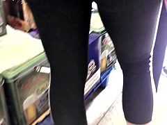 skinny blonde milf in adidas leggings in german supermarket