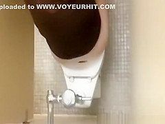 strokes cock while woman peeing
