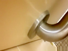strokes cock while woman peeing