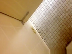strokes cock while woman peeing