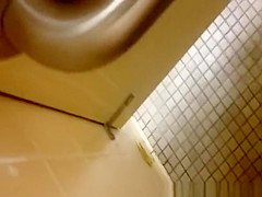 strokes cock while woman peeing