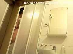 teen 18+ taking shower in bathroom
