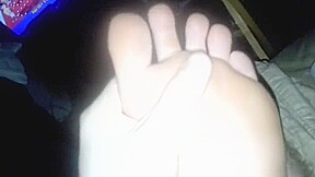 video of me clipping my toenails, smelling feet, and nudity