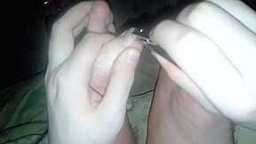 video of me clipping my toenails, smelling feet, and nudity