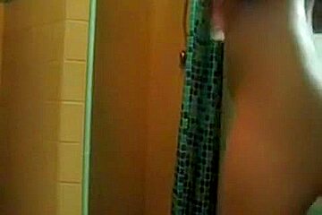 youthful woman fucking a sex-toy whilst this babe is showering